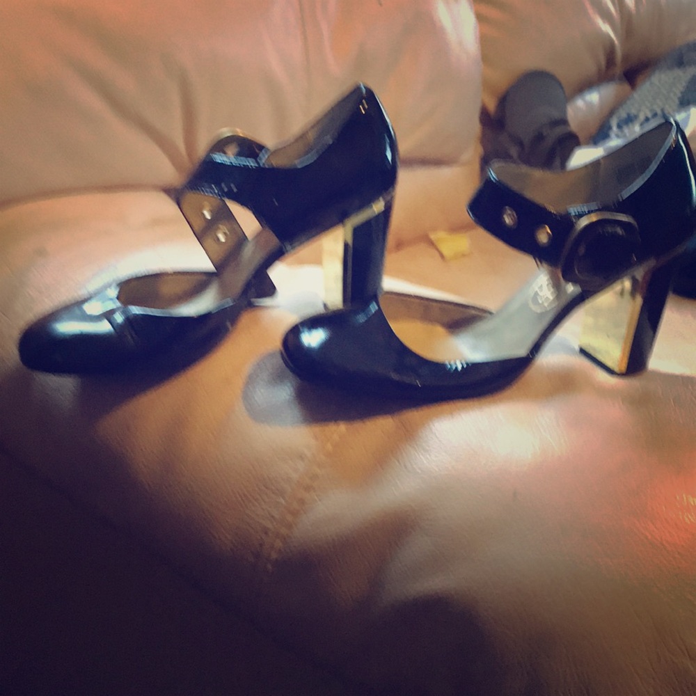 Ash black pumps with gold trim buckle